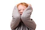 Portrait of a sad young girl on white background