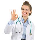 Medical doctor woman showing ok gesture