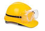 yellow hard hat and goggles on white, small natural shadow under object