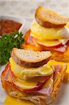 fresh eggs benedict on bread with tomato and ham