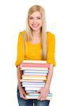 Happy student girl holding pile of books