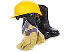 hard hat, boots and gloves on white background, minimal natural shadow among objects