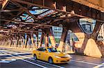 Yellow taxi crossing a bridge over the Chicago River, Chicago, Illinois, United States of America, North America