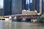 El train crossing Lake Street Bridge over the Chicago River, The Loop, Chicago, Illinois, United States of America, North America