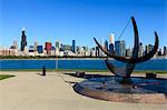 Chicago cityscape from Lake Michigan, the Adler Planetarium Sundial in the foreground with Willis Tower, formerly the Sears Tower beyond, Chicago, Illinois, United States of America, North America