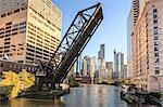 Chicago River and towers of the West Loop area, Willis Tower, formerly the Sears Tower in the background, a raised disused railway bridge in the foreground, Chicago, Illinois, United States of America, North America