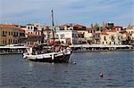 A traditional Cretan boat in the Venetian era harbour at the Mediterranean port of Chania (Canea), Crete, Greek Islands, Greece, Europe