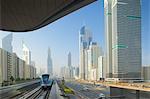 Metro and skyscrapers on Sheikh Zayed Road, Dubai, United Arab Emirates, Middle East