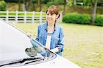 Woman Smiling With Car