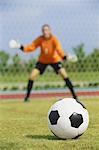 Woman In Goal Keeper Uniform Playing Soccer