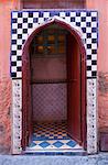 Ornate arched doorway with tiles