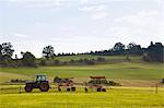 Tractor driving in rural field