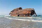 Shipwreck stranded on beach