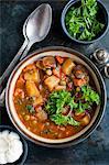 Bowl of stew with herbs