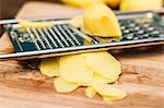 Close up of potato on grater