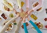 Overhead view of people sharing at table