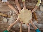 Overhead view of people making bread