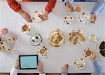 Overhead view of people having tea