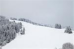 Chairlift on snowy slope