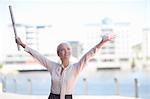 Businesswoman holding blueprints