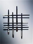 Makeup brushes arranged in pattern