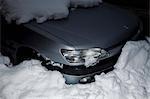 Car buried in snow