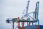 Crane and containers on loading dock