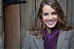 Smiling woman wearing purple scarf