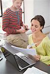 Couple working together at desk