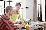 Couple working on laptop together