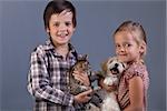 Beautiful kids with their lovely pets - portrait