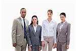 Business team side by side three women and one men against white background