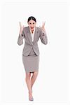 Angry businesswoman shouting against a white background