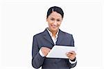 Close up of saleswoman with tablet computer against a white background