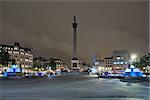 Trafalgar Square is a public space and tourist attraction in central London. Photograph shooting at night with a tripod and the tilt-shift lens, vertical lines of architecture preserved