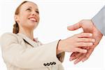 Low angle-shot of shake hands against white background