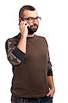 Portrait of young man with beard talking by cell phone