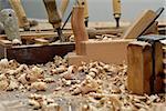 tools for handcraft works on golden wood background