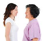 Ageing concept. Asian senior mother and adult daughter face to face, profile side view smiling isolated on white background.