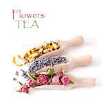 Flowers tea collection in a wooden scoops on a white background.