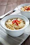 Bowl of vegetarian rice on wood table