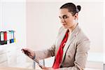 Young Businesswoman Working in Office