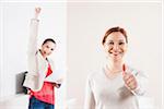 Businesswomen Cheering in Office