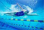 Female swimmer wearing United States swimsuit while swimming in pool