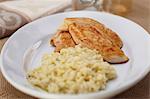 Plate of Baked Chicken Tenders with Risotto