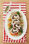 Pork roulade with a mushroom filling on a bed of barley with courgette and carrots and a mushroom sauce