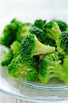 Broccoli florets on a glass plate