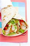 Chicken, salad and tomato wrap