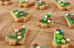 Green Christmas tree-shaped and decorated biscuits for Christmas