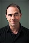 Head and Shoulders Portrait of Mature Man Looking to the Side